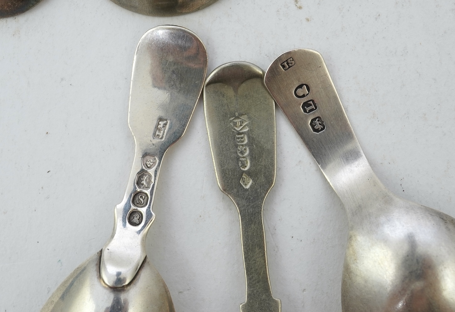 Nine assorted 19th century and later silver and white metal caddy spoons
